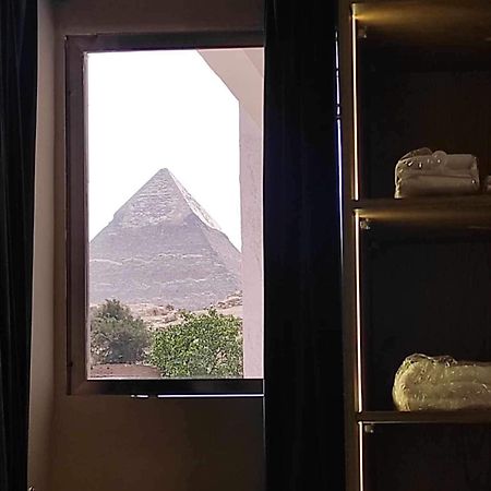Global Pyramids Hotel Kafret el-Gabal Exterior foto